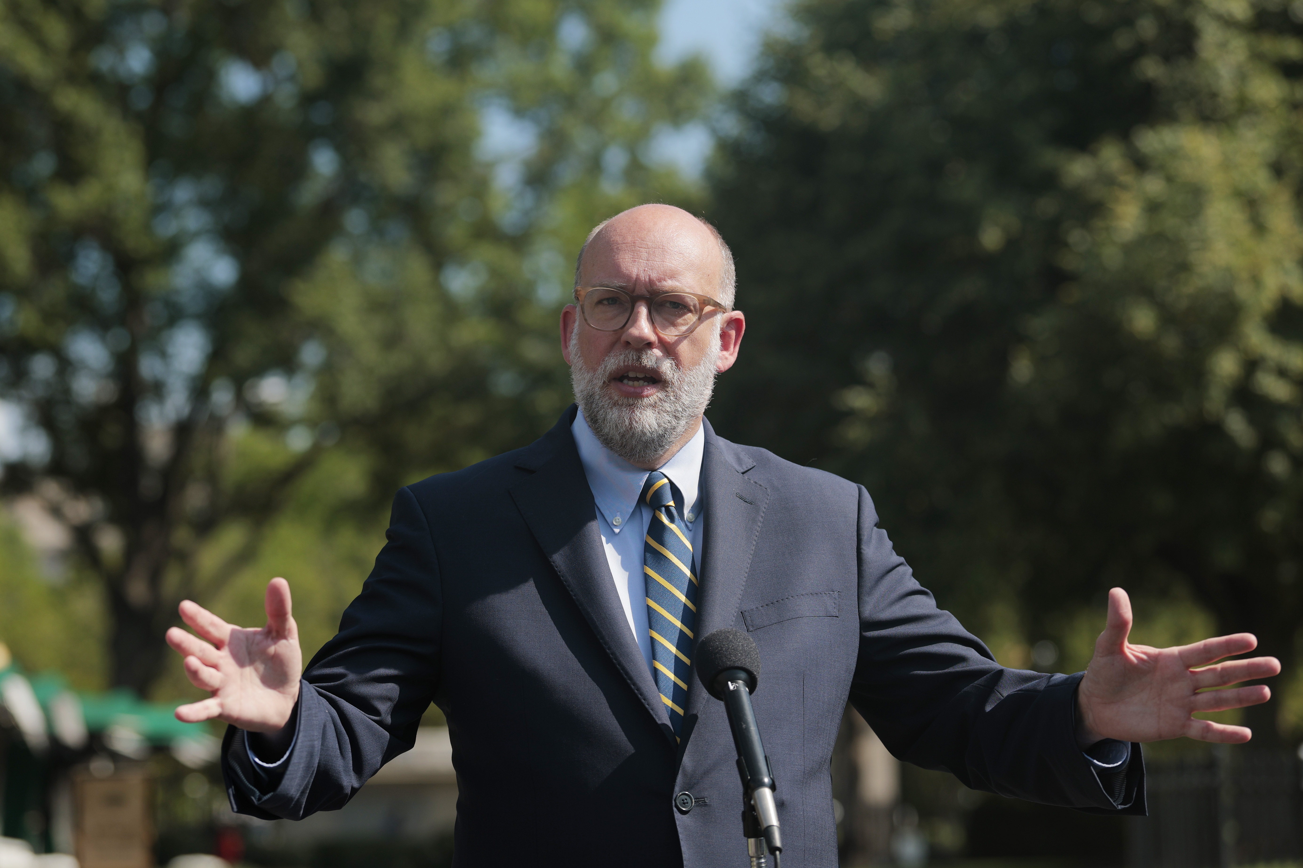 Russell Vought, director of the Office of Management and Budget, speaks with reporters outside of the West Wing of the White House on July 17.